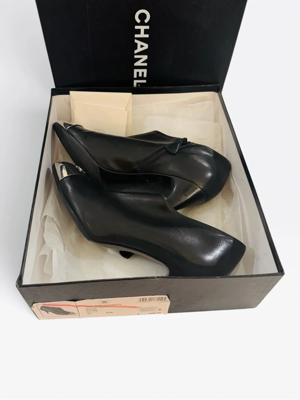 CHANEL Black Leather Ankle Boots with Silver Cap Toe Logo